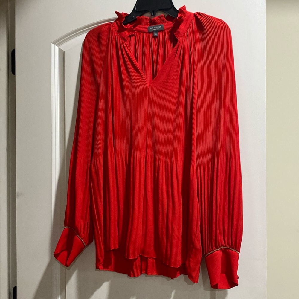 Red pleated blouse